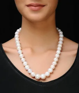 The Timeless Appeal of Cowrie Shell Necklaces